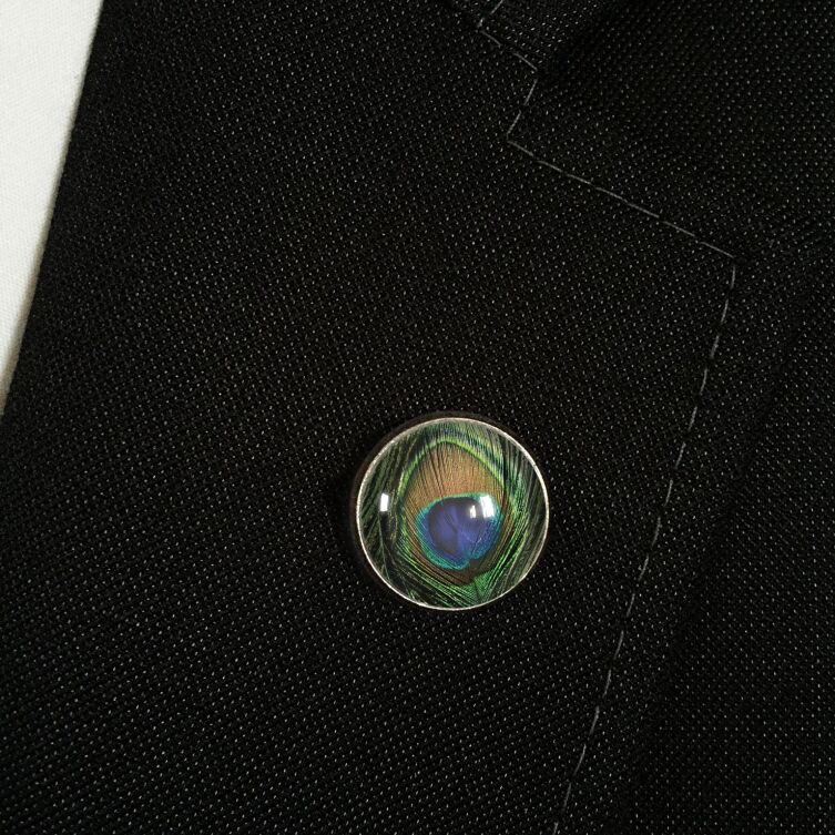 Anstecker Pfau